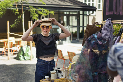 Young man at yard sale