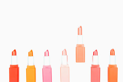 Close-up of multi colored pencils against white background