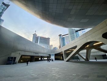 Modern buildings in city against sky