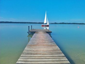 View of pier on calm lake