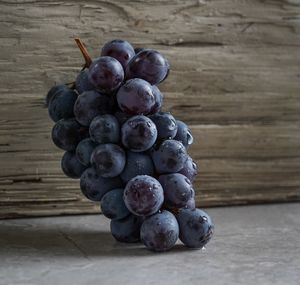 Close-up of grapes on table