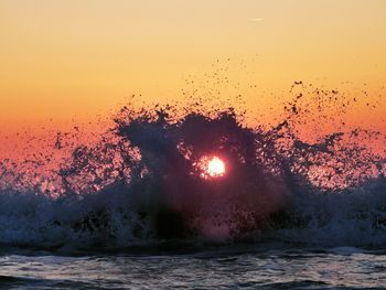 Scenic view of sea at sunset