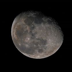 Low angle view of moon against sky at night