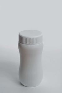 Close-up of drink against white background