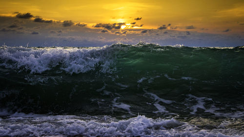 Scenic view of sea against sky during sunset