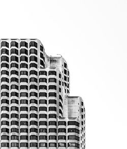 Low angle view of modern building against clear sky