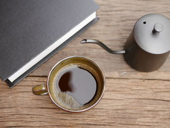 High angle view of coffee cup on table