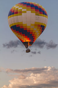 Low angle view of hot air balloon flying in sky