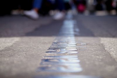 Surface level shot of text on street