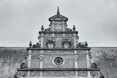 Low angle view of historic building against sky