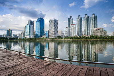 Panoramic view of river and buildings against sky