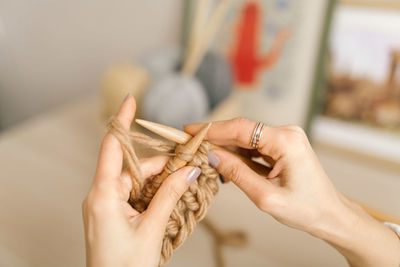 Close-up of woman holding hands