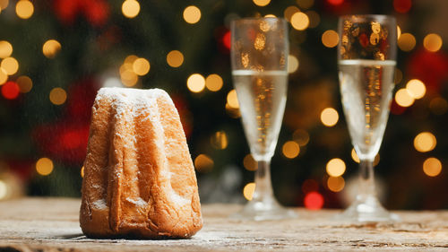 Pandoro and glasses of champagne christmas food