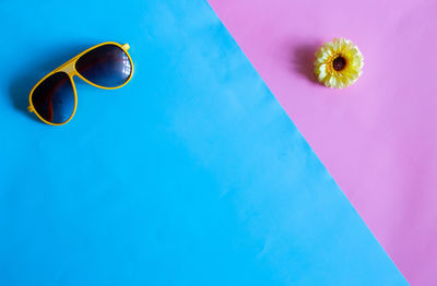 Low angle view of yellow flower in swimming pool