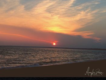 Scenic view of sea during sunset