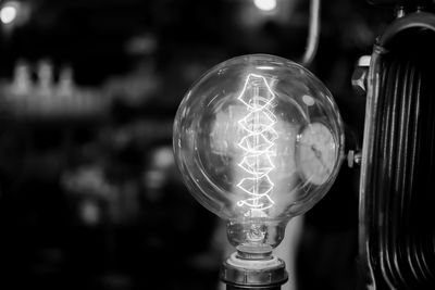 Close-up of illuminated lighting equipment