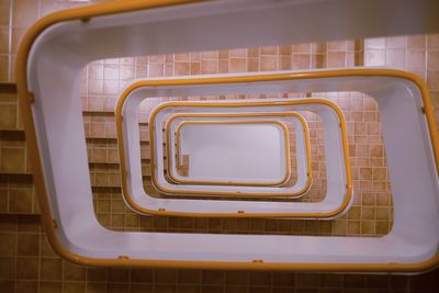 Directly above shot of spiral staircase in building