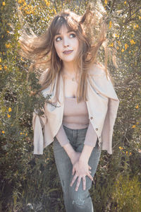 Portrait of young woman in sunlight