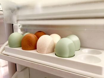 Close-up of eggs arranged in refrigerator