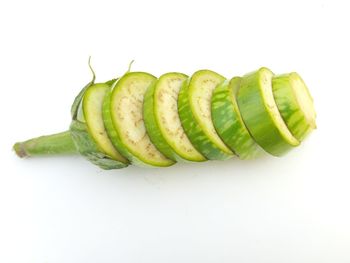 Close-up of bananas against white background