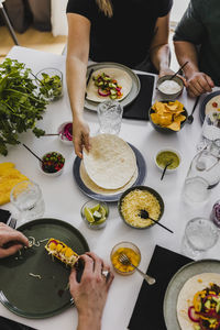 High angle view of people having mexican food