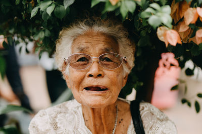 Portrait of woman wearing sunglasses