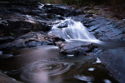 View of waterfall in forest