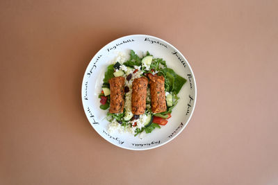 Directly above shot of food served on table