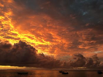 Scenic view of sea against sky at sunset