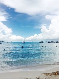 Scenic view of sea against cloudy sky