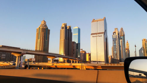 Modern buildings against clear sky in city