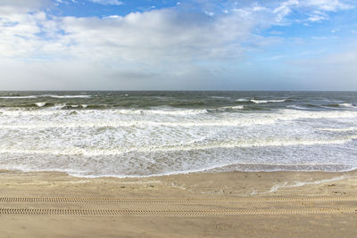 Scenic view of beach against sky