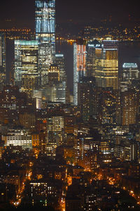 Illuminated cityscape at night