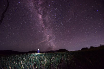 Scenic view of star field against sky