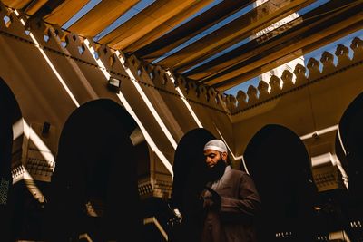 Man standing in mosque