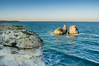 Scenic view of sea against clear sky