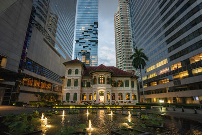 Illuminated buildings in city at night