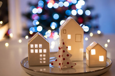 Close-up of illuminated christmas decoration on table