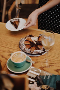 Close-up of coffee cup and drink on table