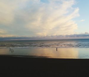 Scenic view of sea against sky at sunset