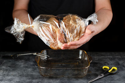 Close-up of man preparing food