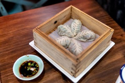 High angle view of food in box on table