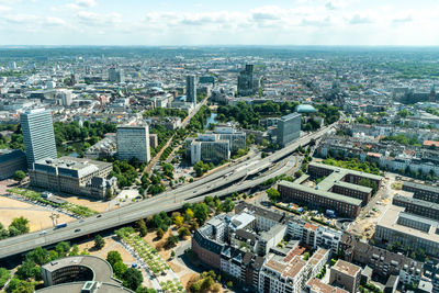 High angle view of buildings in city against sky