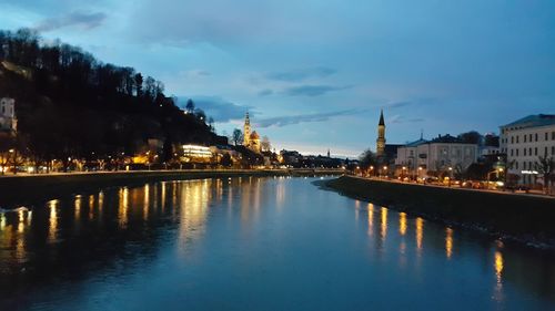 Reflection of illuminated buildings in water