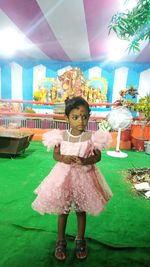 Portrait of a girl standing outdoors