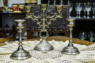 Close-up of wine glasses on table