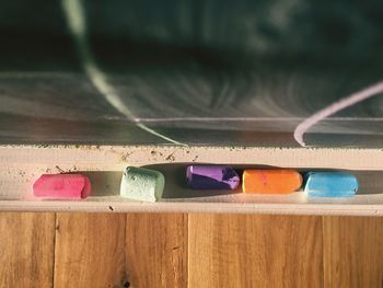 Close-up of toys on wood