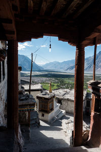 Scenic view of landscape seen through entrance