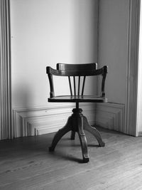 Empty chair on table at home