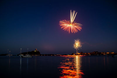 Firework display over nora bay, sardinia